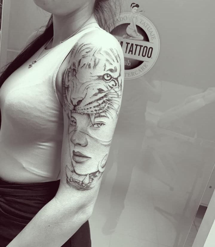 tatuaje de tigre en el brazo